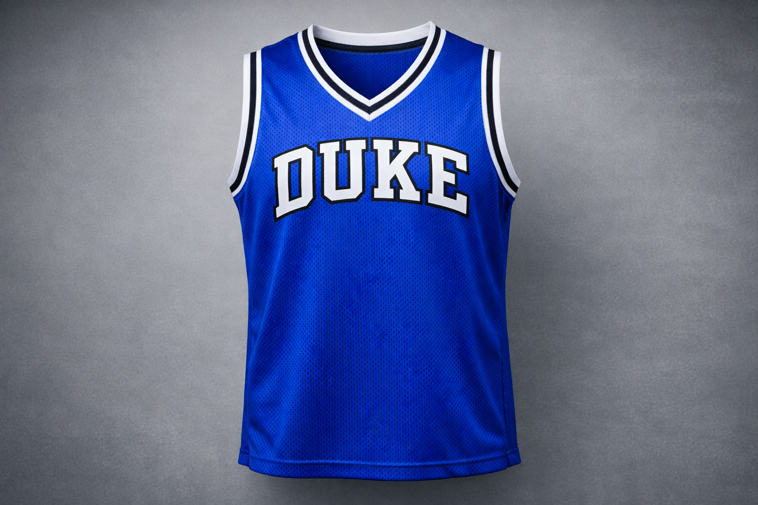 Royal blue Duke Blue Devils basketball jersey with white stitched letters front view.