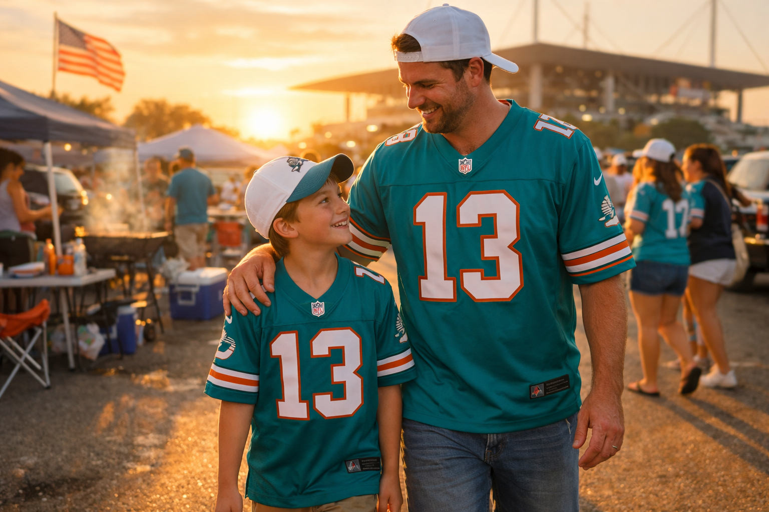 A father and son wearing matching team jerseys at a stadium tailgate