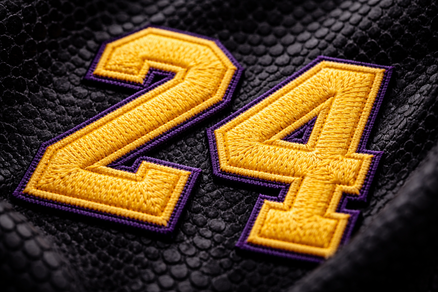 Close up of the snake-skin texture on a Black Mamba Los Angeles Lakers jersey