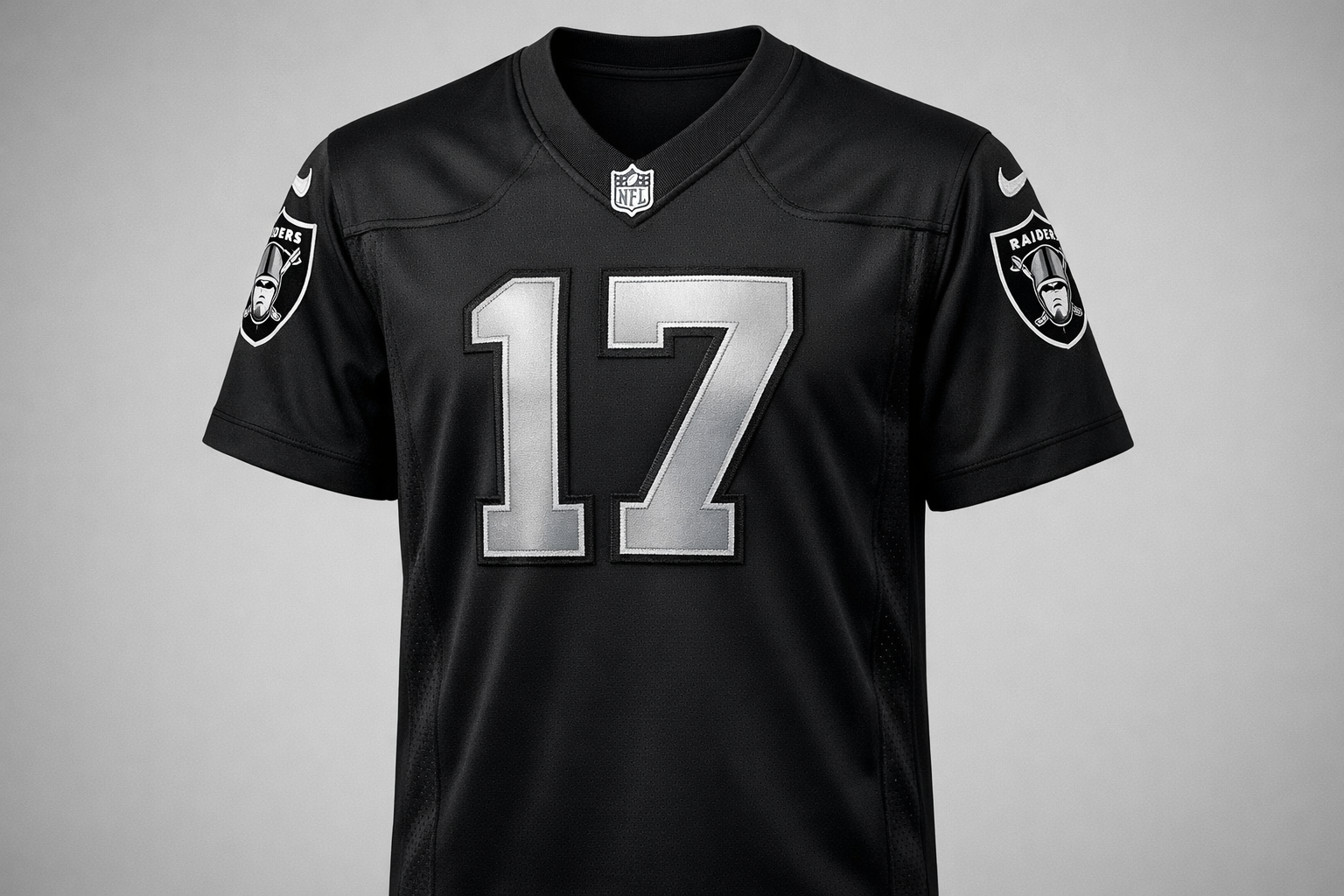 Black Las Vegas Raiders football jersey with silver stitched numbers front view