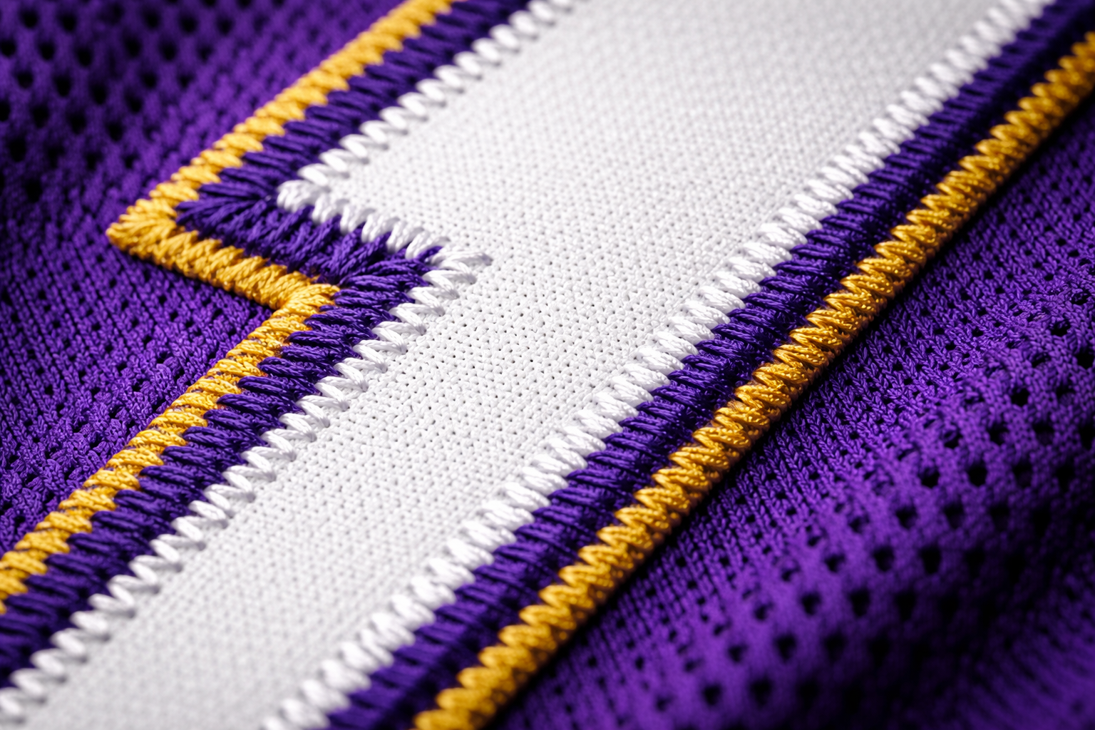 LSU Baseball Jersey: Why the Iconic Gold Design Rules 3 Close up of stitched tackle twill numbers on a purple LSU baseball jersey.