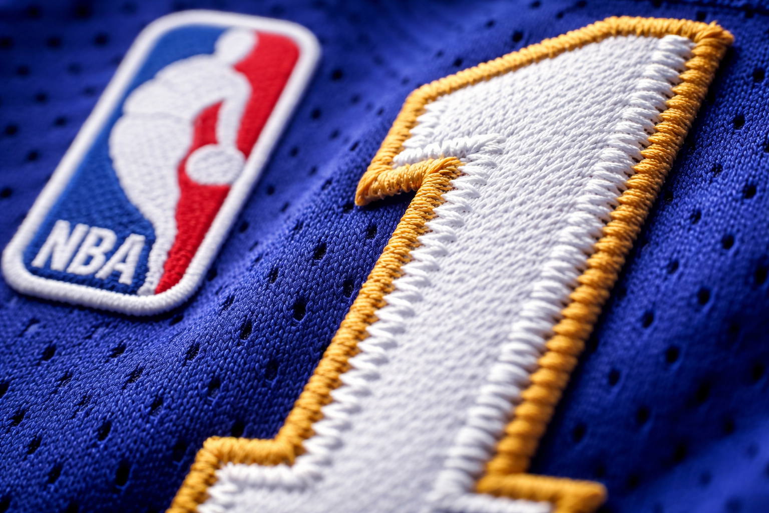 Retro NBA Jerseys: Bringing Back the Iconic 90s Style 3 Close up of stitched tackle twill numbers and NBA logo on a retro jersey