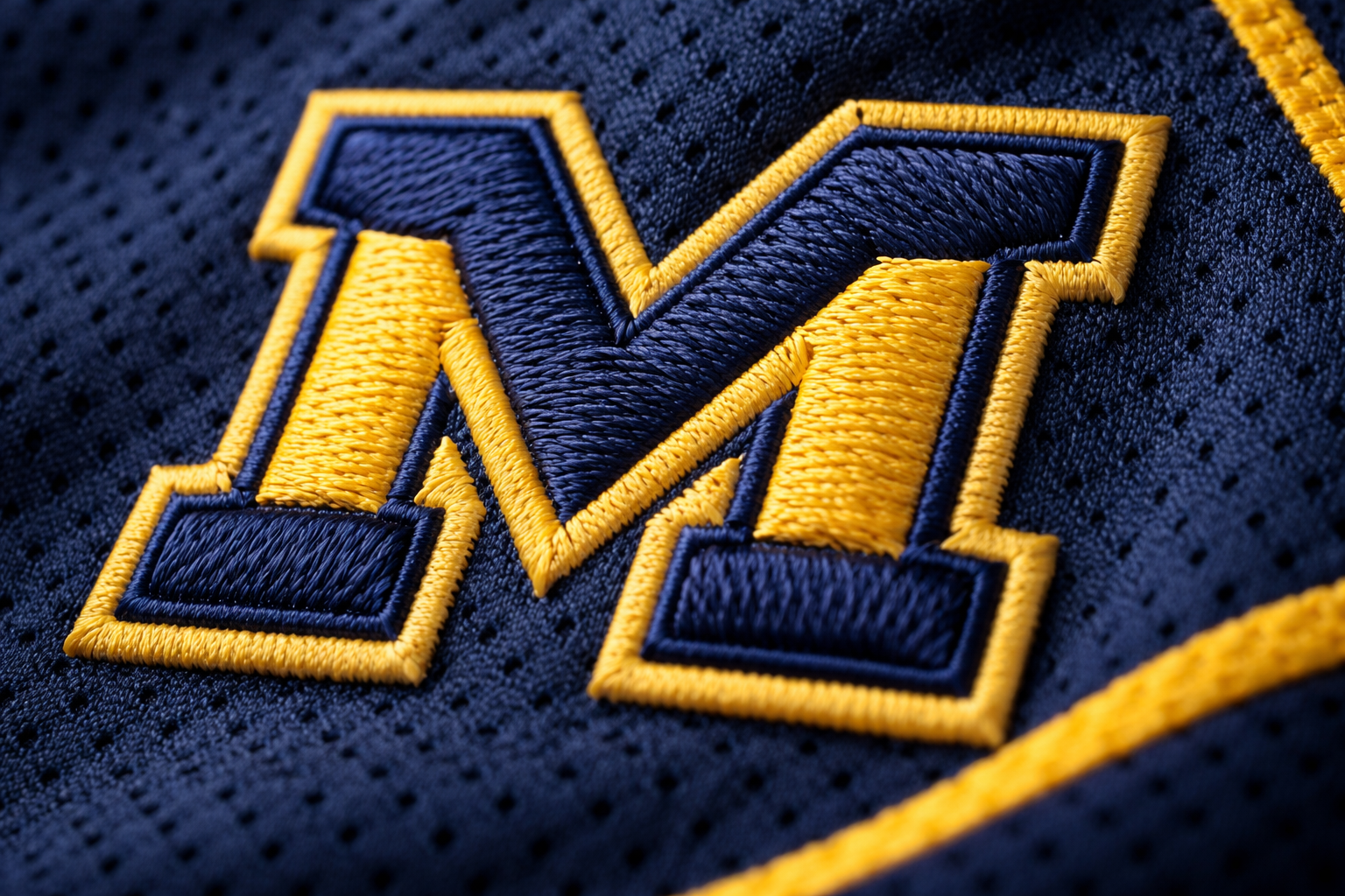 Seattle Mariners Jersey: The Return of the Teal & Trident 3 Macro close up of the vintage stitched trident logo on a Mariners jersey