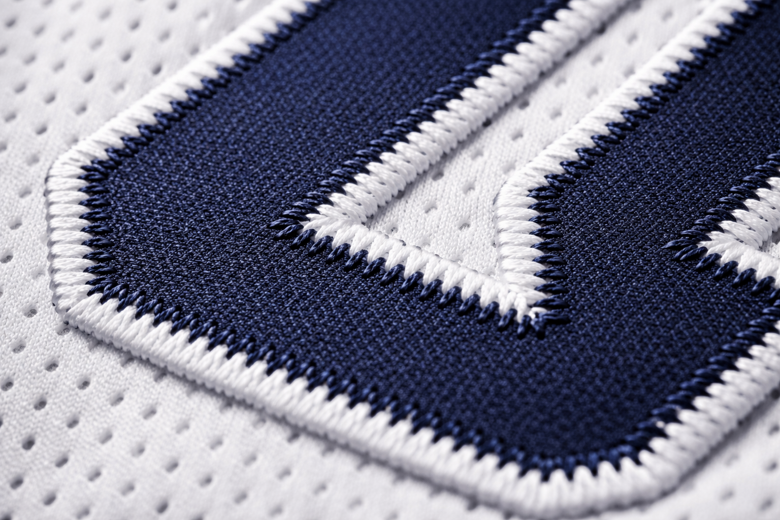 MLB Jersey Size Chart: Find Your Perfect Fit for 2026 2 Close up of high quality stitched tackle twill numbers on a white baseball jersey.