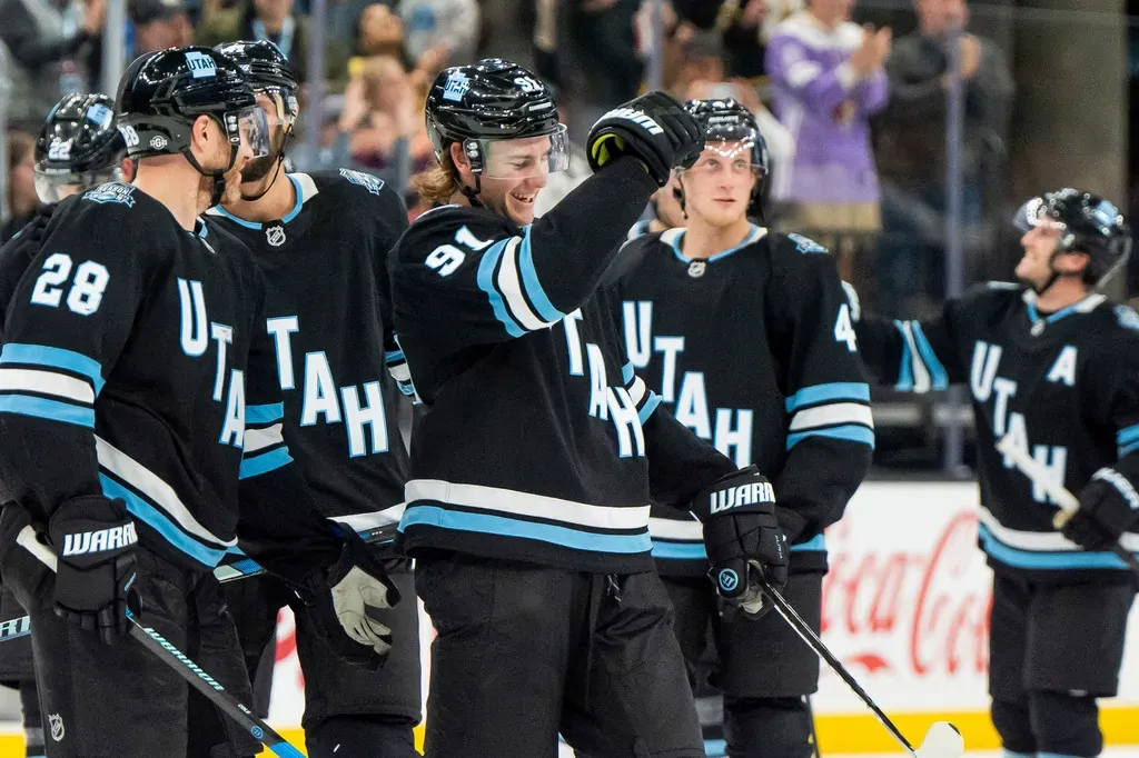 Utah Hockey Club inaugural season jersey in Rock Black and Mountain Blue