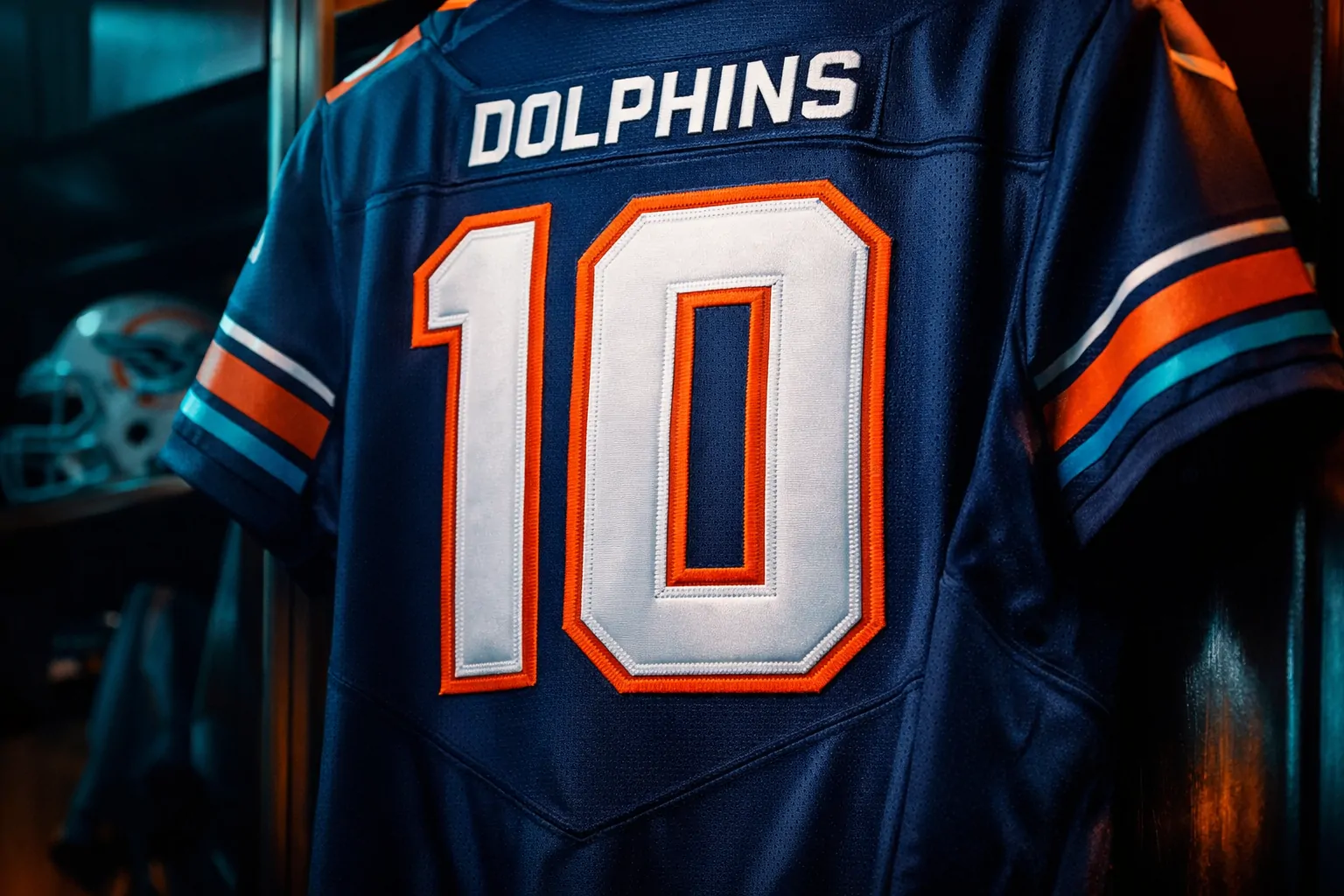 Top 10 Best Selling NFL Jerseys of 2025 (So Far) 3 Viral Miami Dolphins Pitch Blue Rivalry jersey for sale with neon orange stitching.