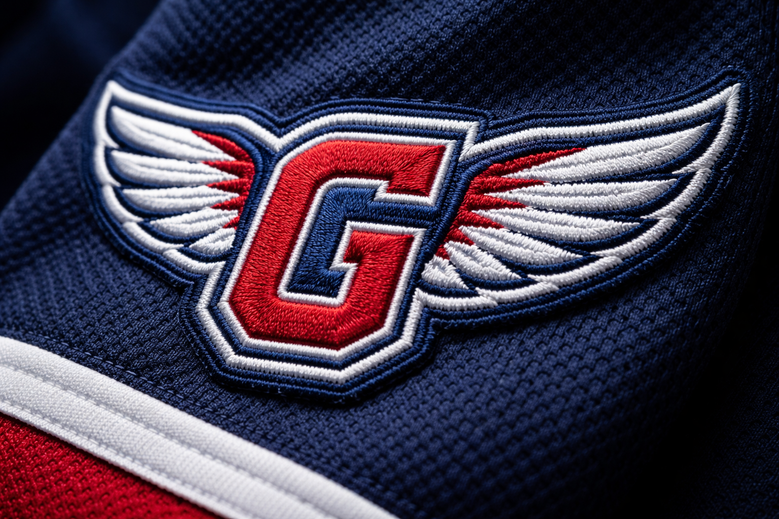 Cleveland Guardians Jersey: New Designs & Stitched Quality Guide 3 Macro close up of the winged G logo stitched on a Cleveland Guardians jersey