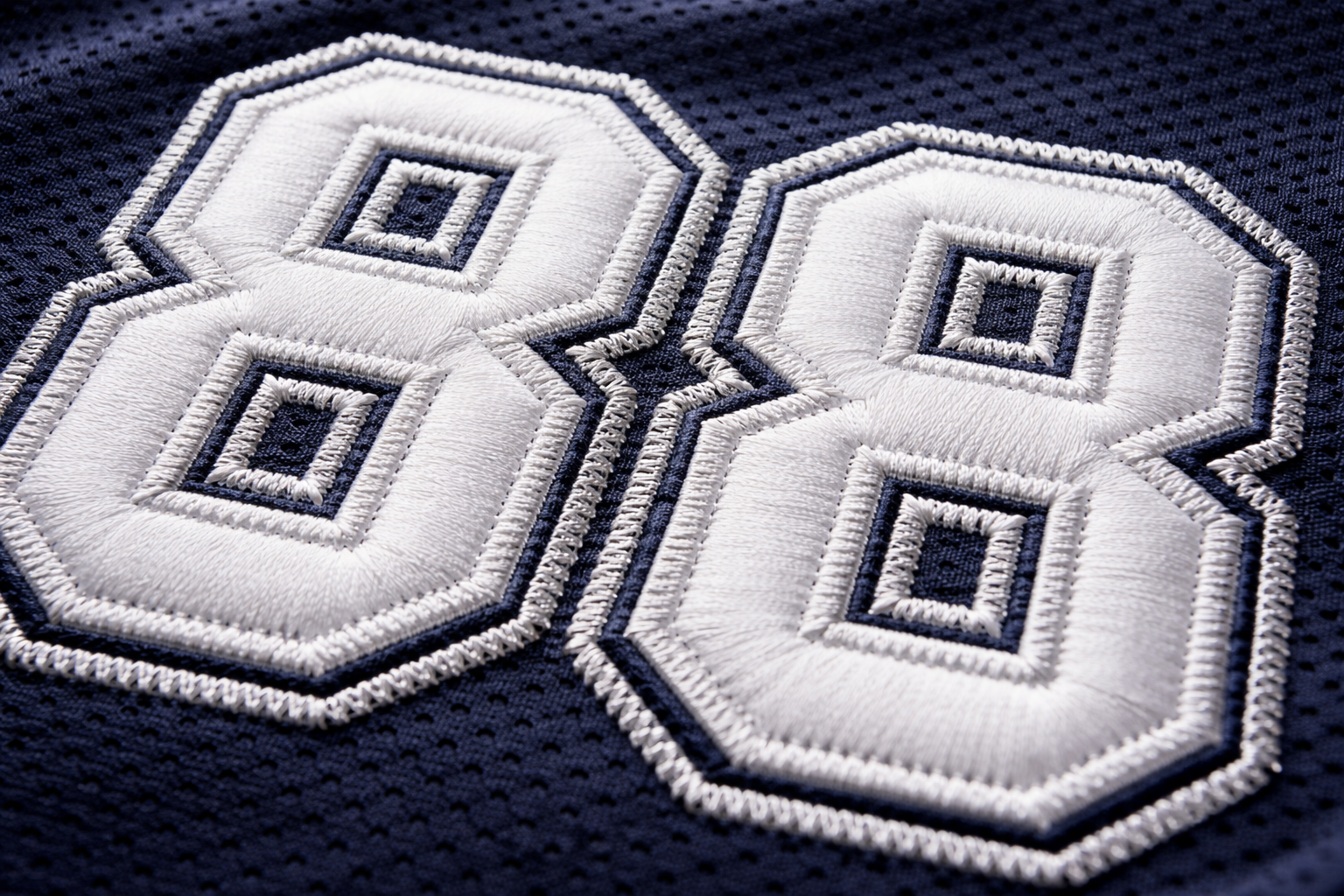 Custom Hockey Jerseys: Stitched Gear for Beer Leagues 3 Macro close up of stitched tackle twill numbers on a custom hockey jersey.